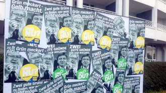 Plakate von FDP und Grünen in Hessen