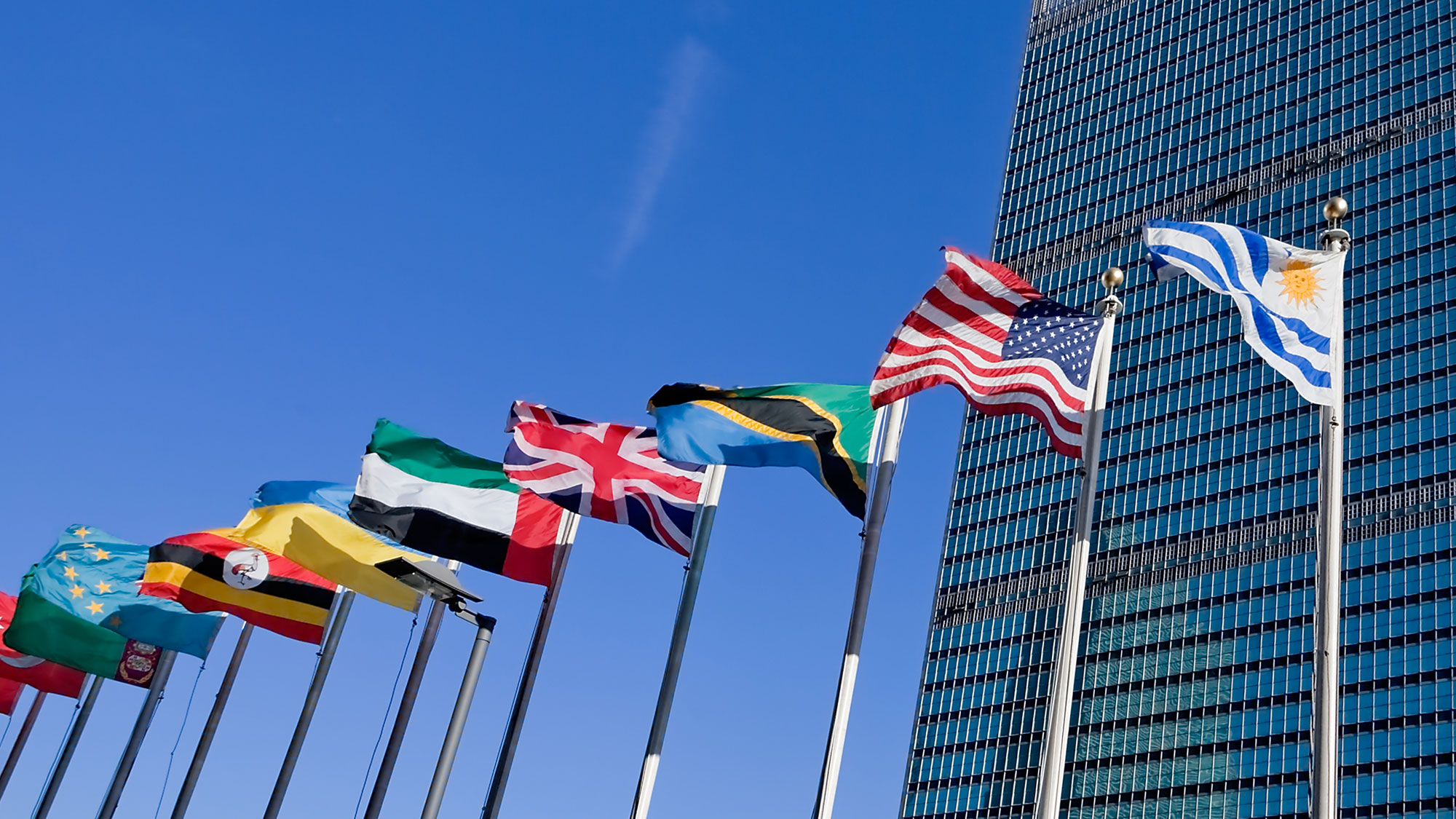 Стандарты оон. Штаб-квартира ООН В Нью-Йорке. Штаб-квартира ООН В Нью-Йорке фото. ООН Туркменистан флаги. Здание ООН В Нью-Йорке.
